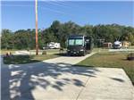 Class A motorhome parked at campsite at ASHLAND RV CAMPGROUND - thumbnail