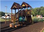 Playground near parked RVs at ASHLAND RV CAMPGROUND - thumbnail