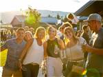 A group of young people at an outdoor concert at 12 TRIBES LAKE CHELAN CASINO & RV PARK - thumbnail