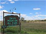 The brown and teal entrance sign at DAVIS MOUNTAIN RV PARK - thumbnail