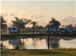 Some RV sites by the lake at QUILLY'S BIG FISH RV PARK - thumbnail