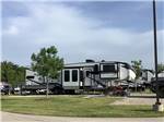 A fifth wheel trailer in a RV site at THE RETREAT AT SHADY CREEK - thumbnail