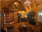 Camping cabin with loft and vaunted ceiling at PINE CREEK CABINS AND CAMPGROUND - thumbnail