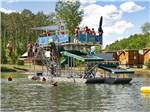 Kids playing on the Big Kahuna Waterpark at MONT DU LAC RESORT - thumbnail