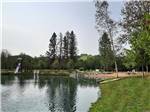 The beach area with a water slide at MONT DU LAC RESORT - thumbnail