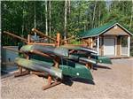 Canoes on a rack by the cabin at MONT DU LAC RESORT - thumbnail