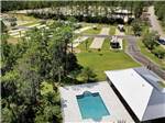 Aerial photo of the swimming pool at WHISPERING PINES RV RESORT EAST AND WEST - thumbnail
