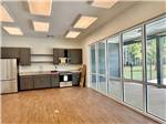 Inside view of the communal kitchen at WHISPERING PINES RV RESORT EAST AND WEST - thumbnail