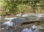 The rushing river nearby at WHISPERING FALLS RV PARK AND STORE - thumbnail