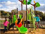 Children having fun on the playground at BRUSHCREEK FALLS RV RESORT - thumbnail