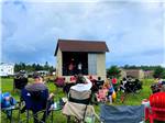 People performing on stage at THE RIDGE CAMPGROUND - thumbnail