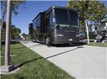 A Class A motorhome parked in one of the paved RV sites at PECHANGA RV RESORT - thumbnail