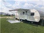 Travel trailer parked onsite at BEYONDER GETAWAY AT RISING SUN - thumbnail
