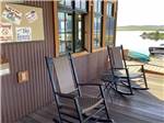 A couple of rocking chairs on the deck at YELLOWSTONE HOLIDAY RV CAMPGROUND & MARINA - thumbnail