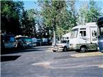 RVs camping on asphalt and dirt at AA ROYAL MOTEL & CAMPGROUND - thumbnail