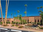 One of the main buildings surrounded by palm trees at DESERTSCAPE - thumbnail