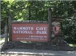 Rustic sign for Mammoth Cave National Park at SINGING HILLS RV PARK - thumbnail