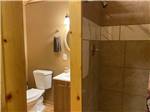 The bathroom and shower at BOOT HILL RV RESORT - thumbnail