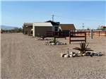 A row of gravel RV sites at BOOT HILL RV RESORT - thumbnail