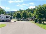 RVs and trailers on paved roads at PINE MOUNTAIN RV PARK BY THE CREEK - thumbnail