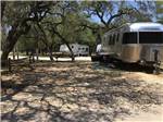 A couple of dirt RV sites at CASCADE CAVERNS & CAMPGROUND - thumbnail