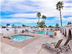 Pool and hot tub with palm trees on a sunny day at ENCORE GOLDEN SUN - thumbnail
