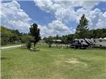A group of grassy RV sites at RIVER BOTTOM FARMS FAMILY CAMPGROUND - thumbnail