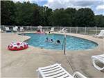 People playing in the pool at RIVER BOTTOM FARMS FAMILY CAMPGROUND - thumbnail
