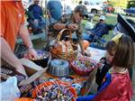 Kids in Halloween costumes trick or treating at RIVER BOTTOM FARMS FAMILY CAMPGROUND - thumbnail