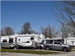 A fifth wheel trailer in an RV site at WILDWOOD GOLF & RV RESORT - thumbnail