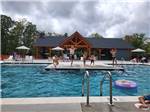 People having fun at the pool at OCEAN CITY CAMPGROUND AND BEACH CABINS - thumbnail