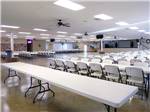 Long tables inside a large conference room at SNOW TO SUN RV RESORT - thumbnail