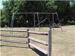 Swingset, slide and merry go round at NORTH STAR RV PARK - thumbnail