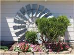 Windmill decoration with flowers at NORTH STAR RV PARK - thumbnail