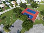 Aerial view of the pickle ball courts and putting green at OUTBACK RV RESORT AT TANGLEWOOD - thumbnail