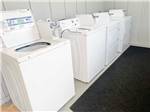 Washers and dryers in the laundry room at BAY PALMS RV RESORT - thumbnail