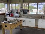 A foosball table in the kitchen area at BAY PALMS RV RESORT - thumbnail