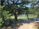 People playing in the river at PARKVIEW RIVERSIDE RV PARK - thumbnail