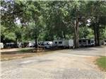 The road behind the RV sites at RV HIDEAWAY CAMPGROUND - thumbnail