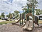 The children's playground set at OAK FOREST RV RESORT - thumbnail
