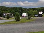 Trailers parked at sites at TWIN GROVE RV RESORT & COTTAGES - thumbnail