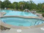Swimming pool with hot tub at MILL CREEK RANCH RESORT - thumbnail