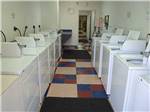 Laundry room with washer and dryers at SHALLOW CREEK RV RESORT - thumbnail