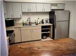 The clean kitchen area at DISTANT DRUMS RV RESORT - thumbnail