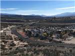 Aerial view of the campground and street at DISTANT DRUMS RV RESORT - thumbnail