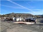 A view of trailers in paved sites at DISTANT DRUMS RV RESORT - thumbnail