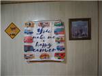 Sign on wall saying You Make Me a Happy Camper at DEER GROVE RV PARK - thumbnail
