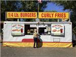 A burgers and curly fries stand at LONG CAMP RV PARK - thumbnail