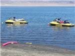 Jet skis on the lake at WHISKEY FLATS RV PARK - thumbnail