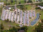 An aerial view of the campsites and lake at CAPITAL CITY RV PARK - thumbnail